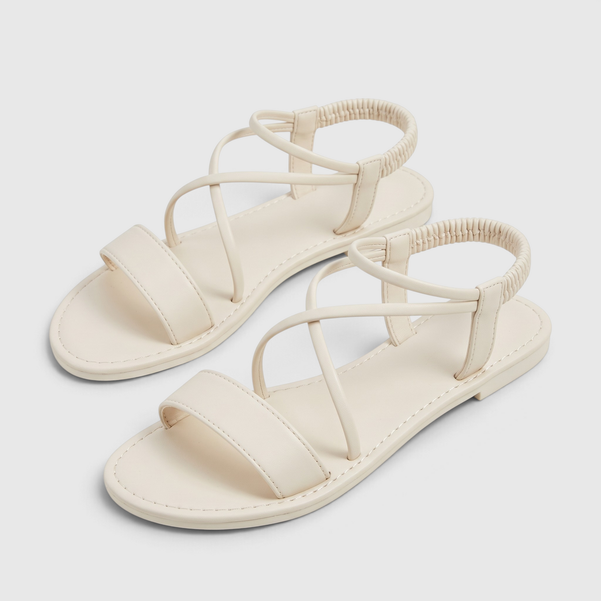 Sandales plates femme à brides croisées et élastique arrière – Nu-pieds d'été souples, légers et confortables pour plage et vacances